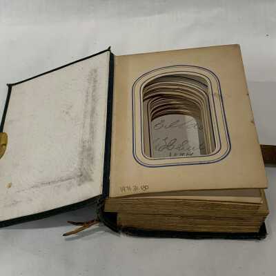 FIC 2015.95 front open: Copyright: The Sutliff Museum; Origsize: 6 x 4.5 x 3.25"; Origformat: Artifact; Resolution: 72 dpi