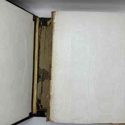 Inside of album showing spine damage