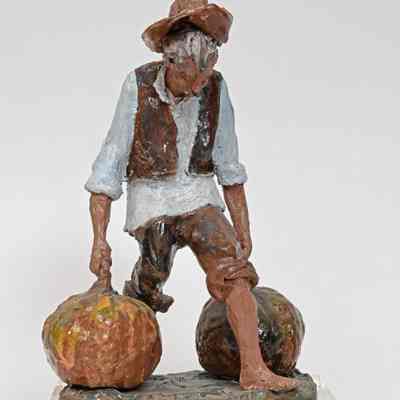 Old Man Carrying Pumpkins