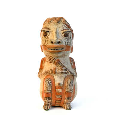 Pre-Columbian Red Clay Male Figure in a Squatting Position.
