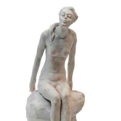 Nude Woman Sitting on a Rock