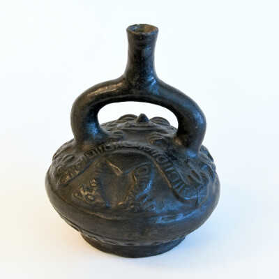 Late Chavin Blackware Relief Molded Stirrup Vessel.