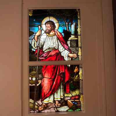 The Nativity of Our Lord (two lancets with tracery stained-glass windows)