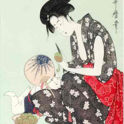 A Young Woman Peeling Fruit While Her Child Watches