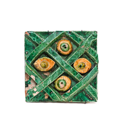 Chinese ceramic tile with four eyes