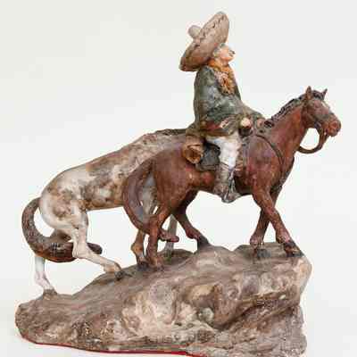 Man on Horseback Leading Another Horse