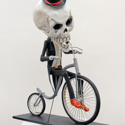 Skeleton Riding a Bicycle