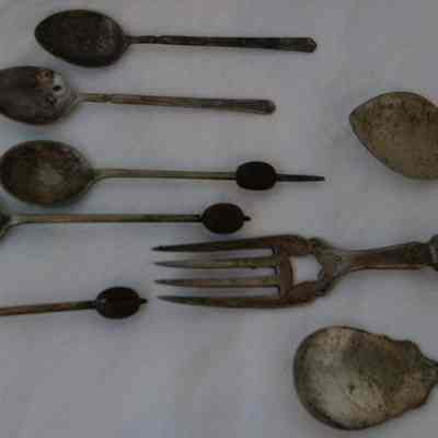 Silver teaspoons and cake fork