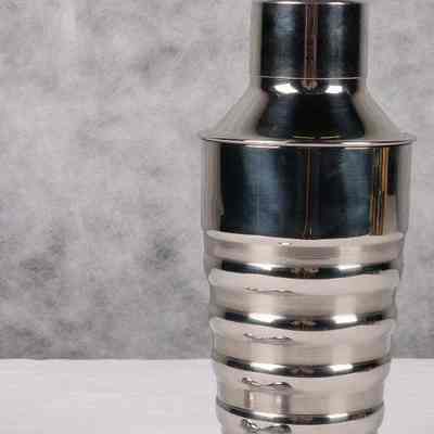 Cocktail shaker with spirit measure