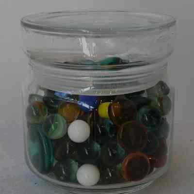 Glass- Jar with marbles and pebbles