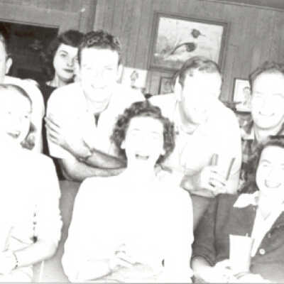 Family Gathered Around Sofa