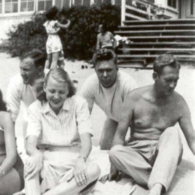Three Guys and a Gal on the Sand
