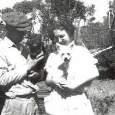 Unidentified couple with pets