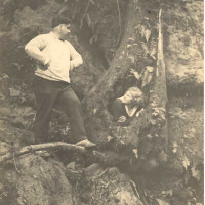Large Man & Blond Woman in Tree