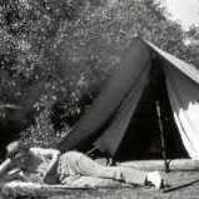 Man Laying by Tent