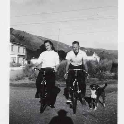 Francisco Patio; Bridget and William Curr with family dog. It’s around 1947.
