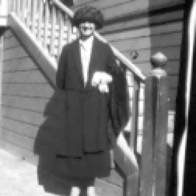 Woman by Stairs