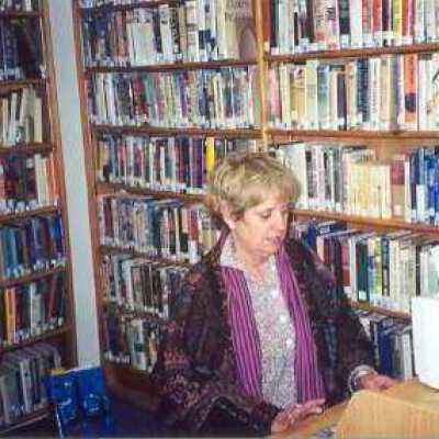 Woman Working in Old Library