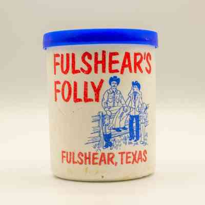 Fulshear's Folly foam koozie with lid (facing the front)