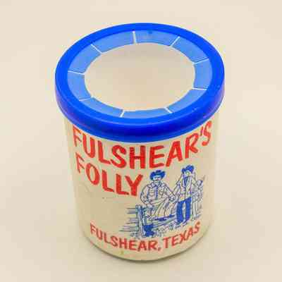 Fulshear's Folly foam koozie with lid (top-down image)