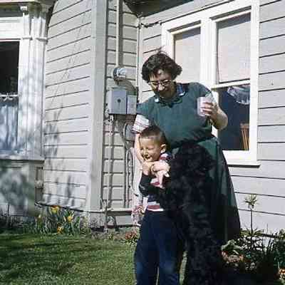 21. KJH and his mother, EYH, with Penny, by Zylstra House: Zylstra House - May 1960