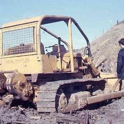 27. Krieg Construction bulldozer clearing Ebey's Landing beach, KJH: Ebey's Landing - ca. 1968