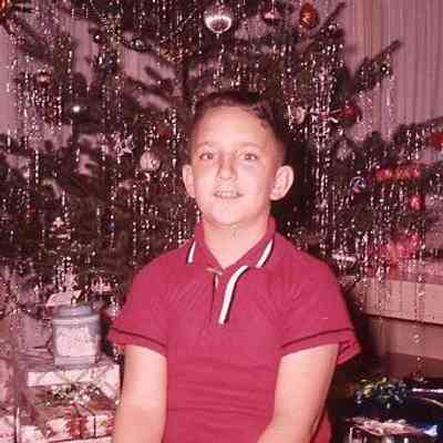 34. KJH in front of Christmas tree and presents: Zylstra House - ca. 1960