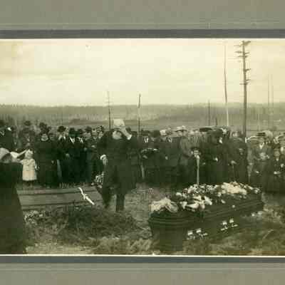 188 - Funeral of Mary McCrohan Morse in Oak Harbor: George Morse at graveside with hand to face