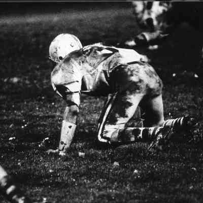 Muddy football game.