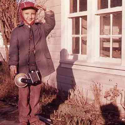 59. KJH with camera by Zylstra House outbuilding: March 1959