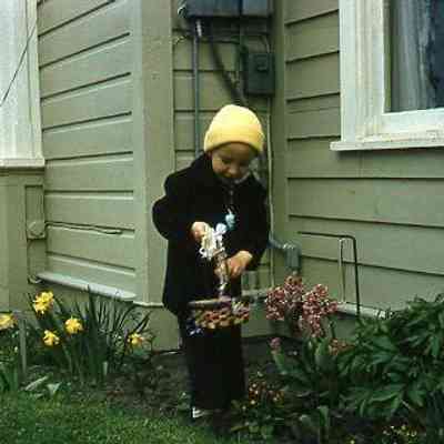 67. KJH Easter egg hunt with Easter basket: Zylstra House - April 1957
