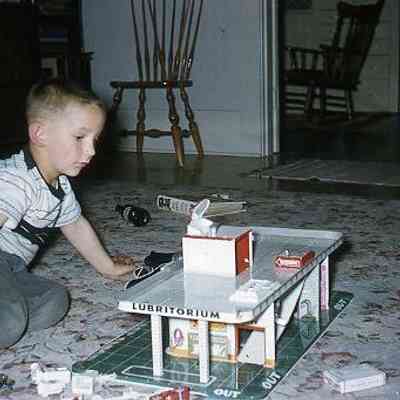 77. KJH and toy gas station: Zylstra House - April 1947
