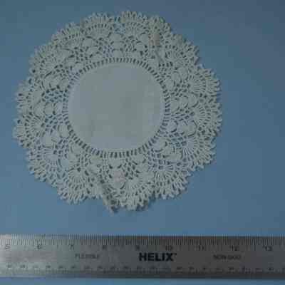 433 - doily - handkerchief linen center w/ crocheted edge: Made by Mollie Cranney Clapp
