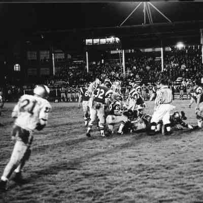 Muddy football game.
