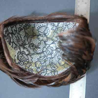 402 - brown feather hat underside