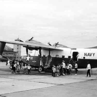 Visitors climb into amphibious plane #2362.