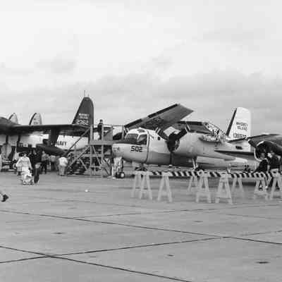 Navy planes lines up at airshow.