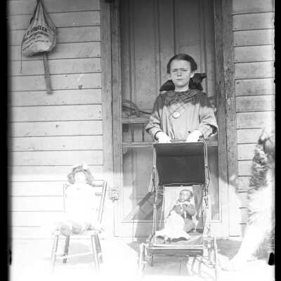 Girl with Dolls