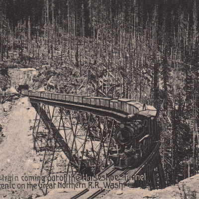 Freight Train coming out of the Horseshoe Tunnel near Scenic on the Great Northern R.R. Wash