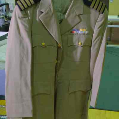D. Tan Dress Jacket