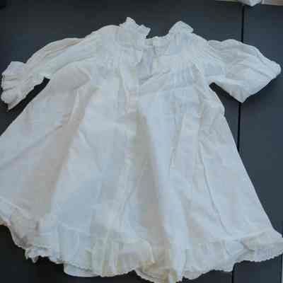 525 - dress, white sheer, w/ long sleeves and ruffles at wrist and hem, child's: Worn by Mary Gaylord Roth when very young