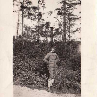 Soldier posing on roadside: Origsize: 3.5x5.5; Origformat: Print-Photographic