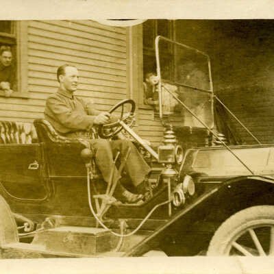 Grover Allen driving: Origsize: 3.5x5.5; Origformat: Print-Photographic