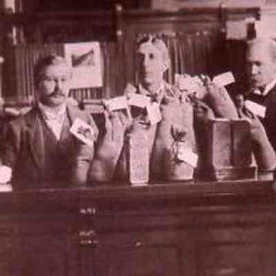 Men Around a Sales Counter