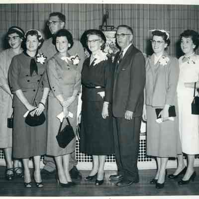 Jim (in back looking left), Vera (center) and Carl (center) Izett with the Cleveland sisters