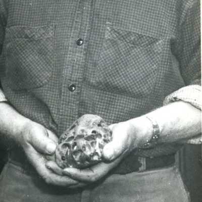 Man Holding Rock