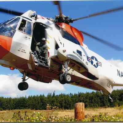 USN UH-3 Sea King taking flight