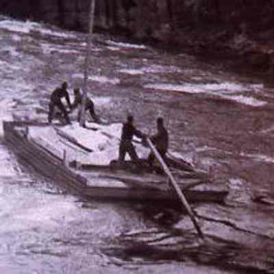 Prospectors Paddle a River