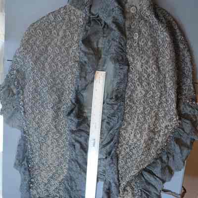 2023.dpw.362 - black cape heavily decorated w/ jet beads and ruffle trim
