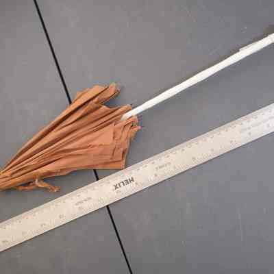 595 - Child's umbrella, brown w/ white painted handle